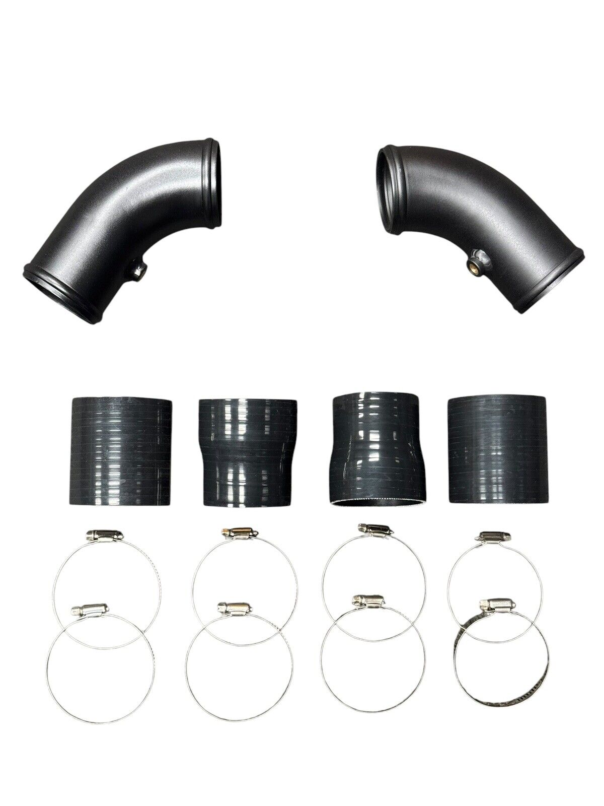 High flow turbo charge pipe upgrade kit for BMW F10 F12 F13 M5 M6 S63 engine by JackSpania Racing, showing the polished metal pipes.