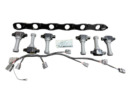 VR38 twin cam ignition coil conversion kit for Nissan RB R32 GTR engine, featuring JackSpania Racing brand ignition coils.