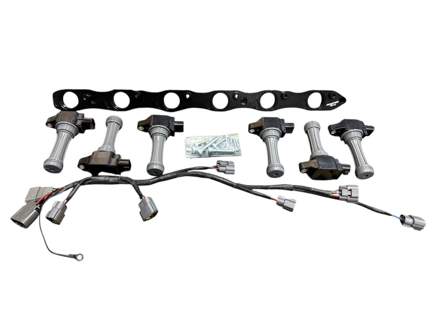 VR38 Twin Cam ignition coil conversion kit for Nissan RB R32 GTR engine, featuring high-quality engine parts by JackSpania Racing