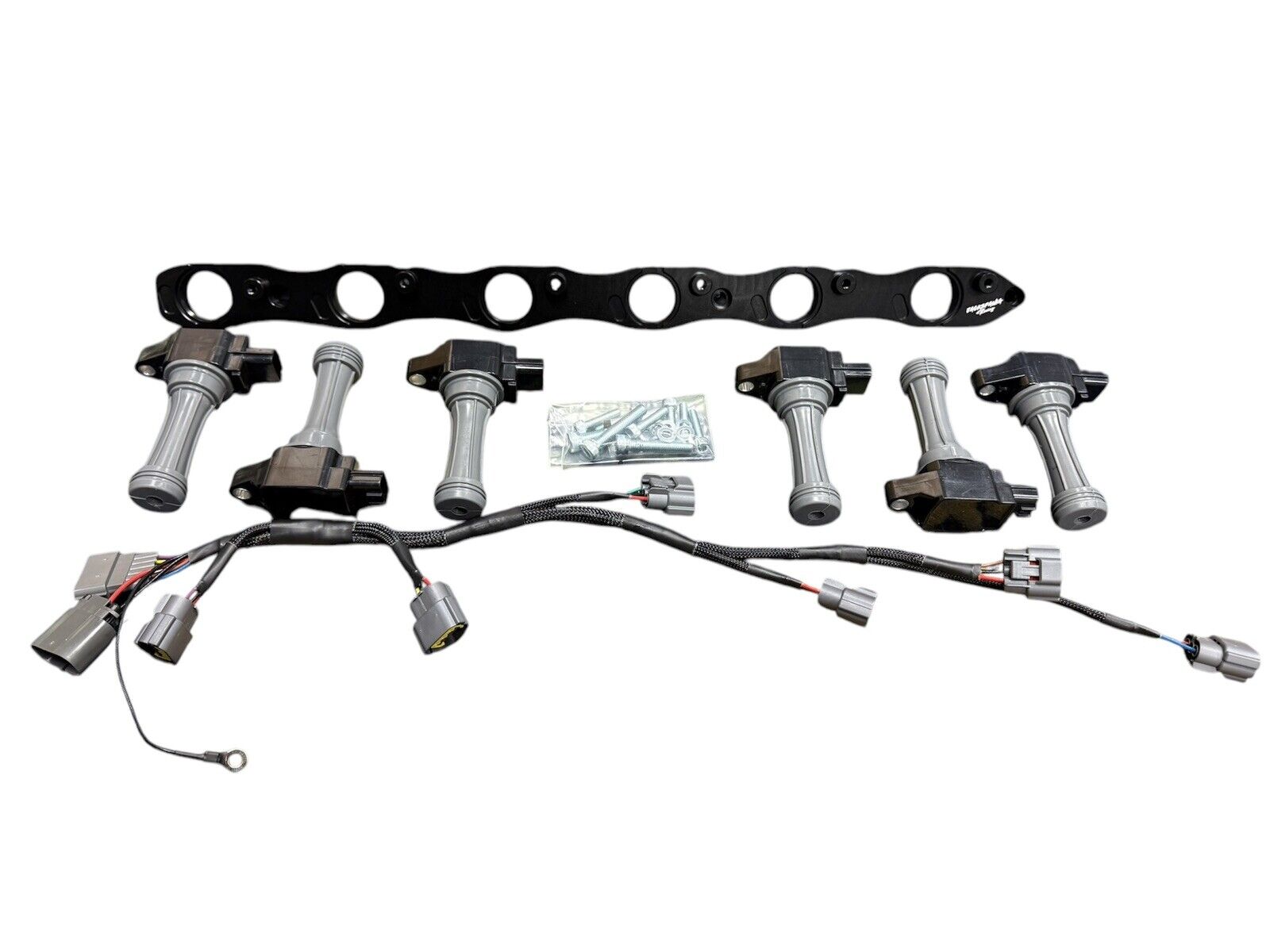 VR38 Twin Cam ignition coil conversion kit for Nissan RB R32 GTR engine, featuring high-quality engine parts by JackSpania Racing
