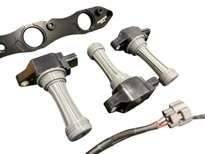 VR38 twin cam ignition coil conversion kit for Nissan RB R32 GTR engine parts by JackSpania Racing, featuring multiple ignition coils.
