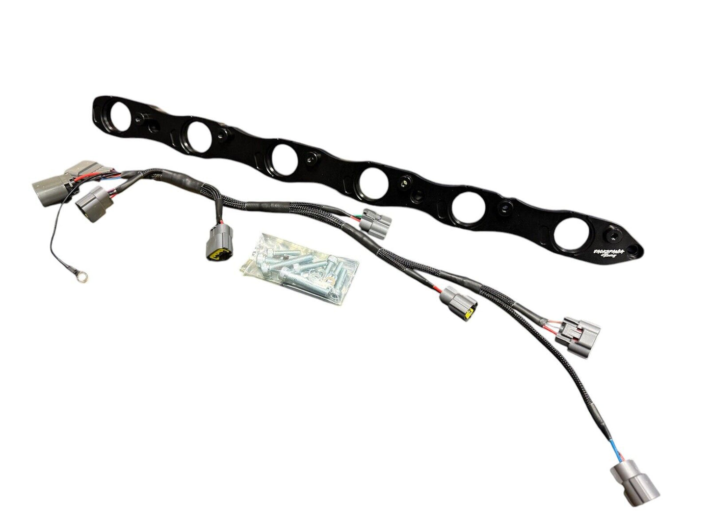 JackSpania Racing VR38 twin cam ignition coil conversion kit for Nissan RB R32 GTR engine parts, showing the coil components.