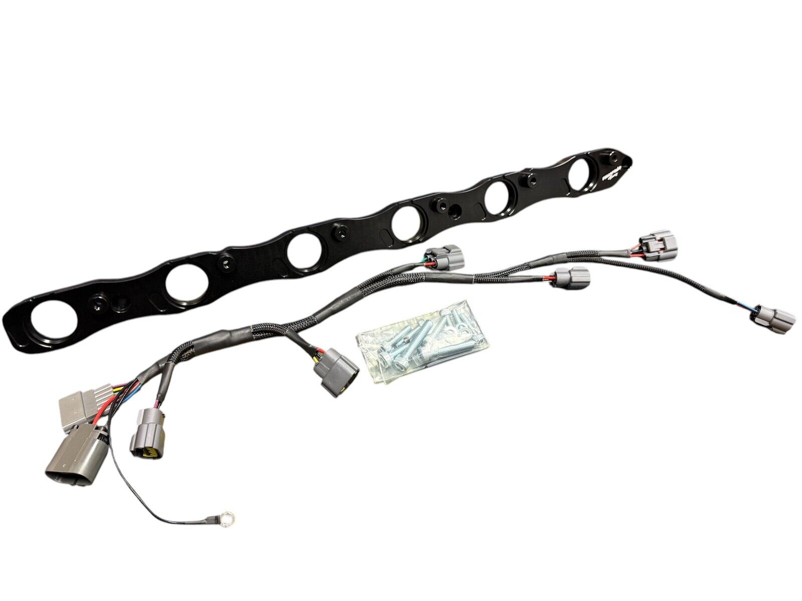 VR38 twin cam ignition coil conversion kit for Nissan RB R32 GTR engine, featuring JackSpania Racing brand engine parts.