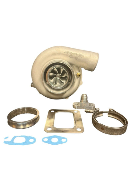 JackSpania Racing billet wheel turbo with T3/T4 V-band turbine housing and dual V-band flange for high-performance engine tuning.