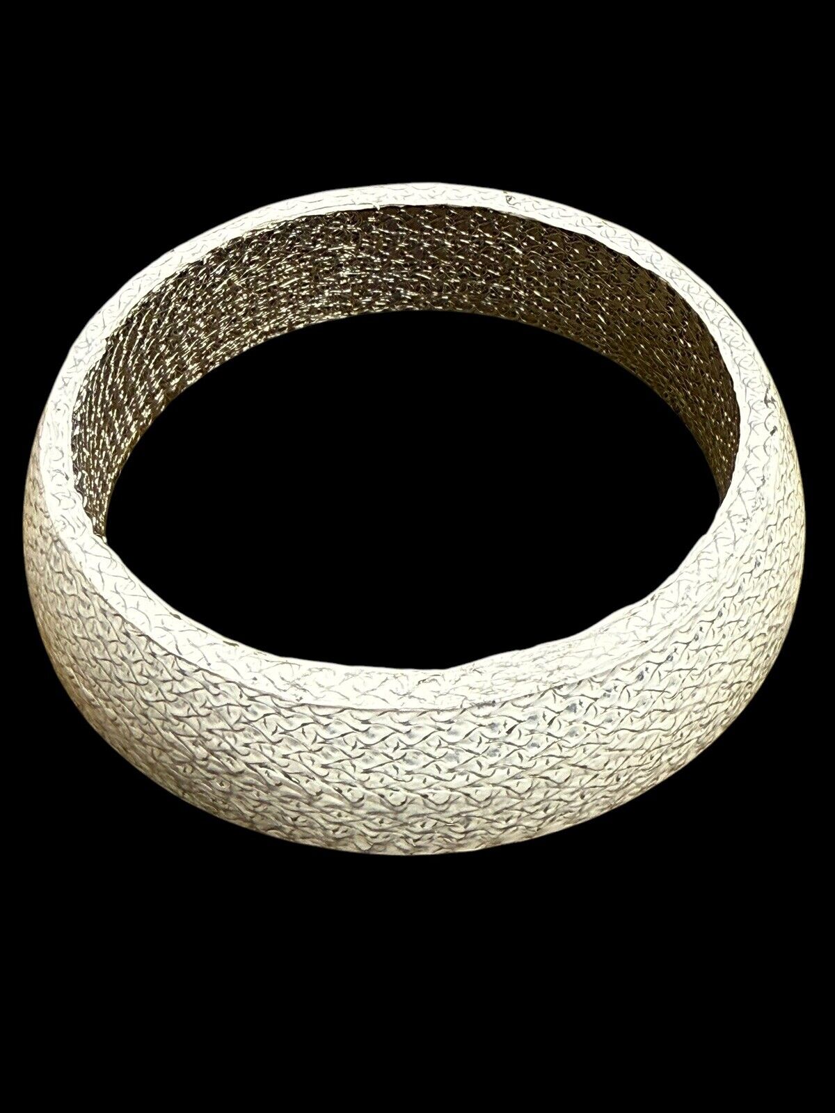 JackSpania Racing universal donut exhaust gasket in 2, 2.5, and 3-inch sizes, showing the gasket's rubber and metal construction.