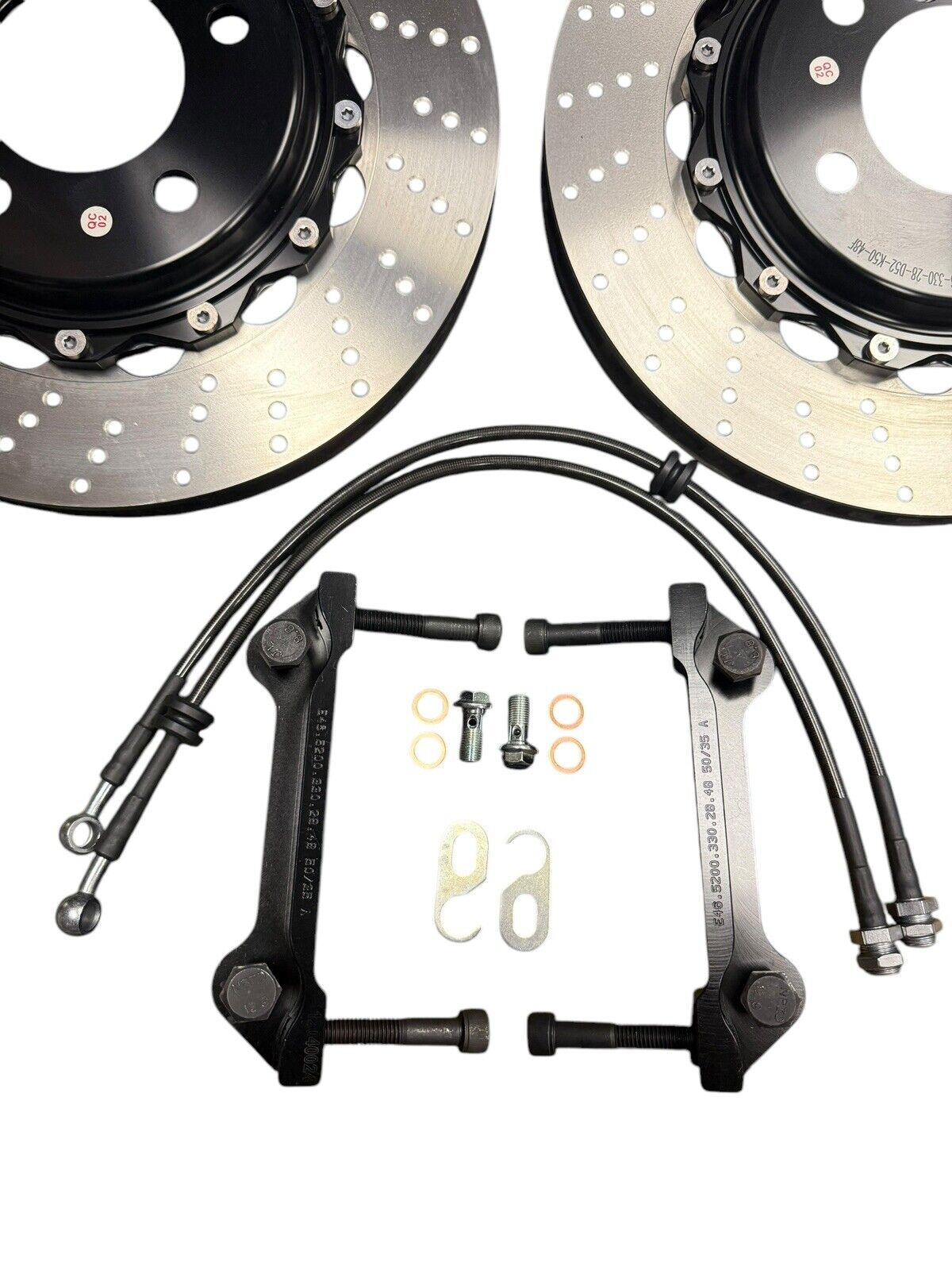 Interior view of JackSpania Racing Big Brake Kit with drilled rotors and 4-piston calipers for BMW E46 2001-2006.