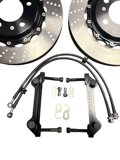 Interior view of JackSpania Racing Big Brake Kit with drilled rotors and 4-piston calipers for BMW E46 2001-2006.