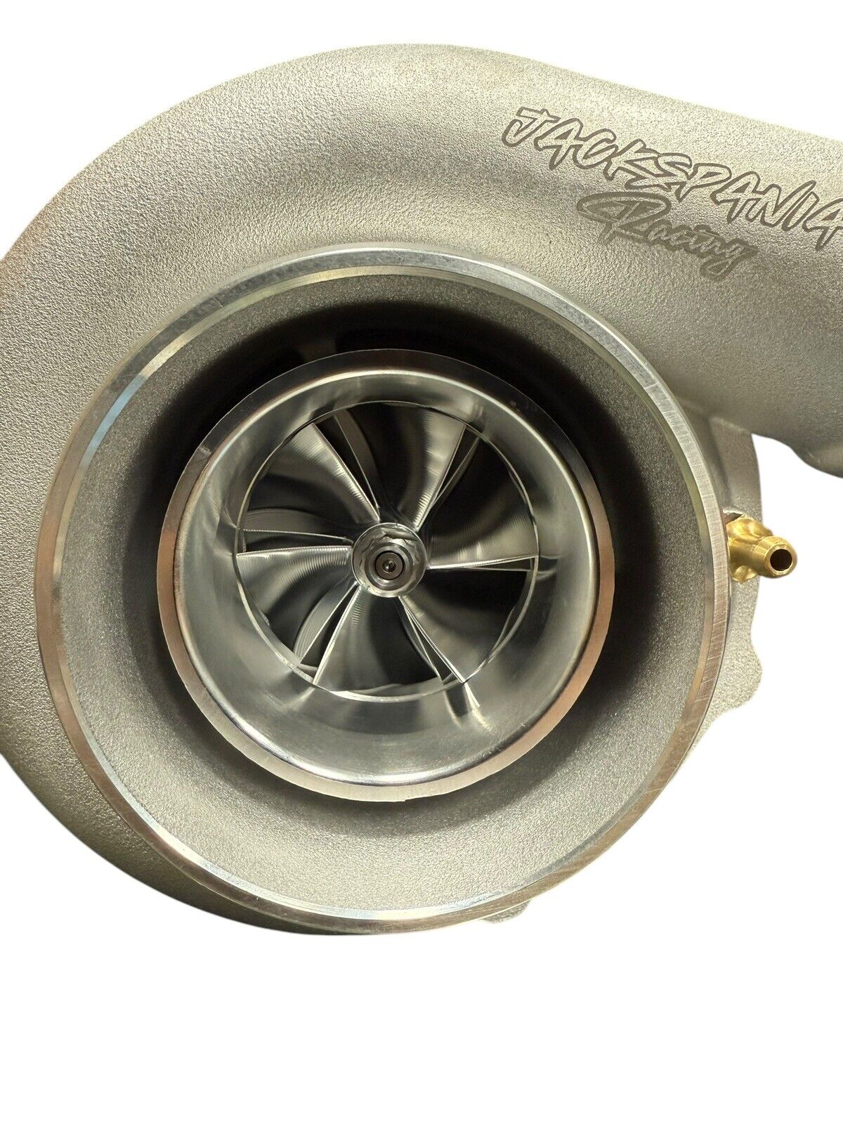 JackSpania Racing billet wheel turbo with T3/T4 .81/.82 dual V-band turbine housing for high-performance engine upgrades.