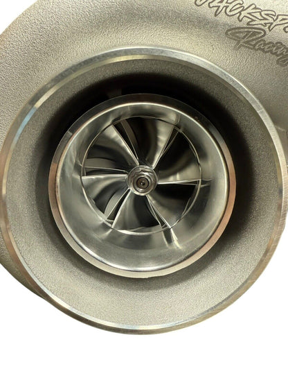 JackSpania Racing billet wheel turbo with T3/T4 dual V-band turbine housing, compatible with PTE 700HP engine applications.