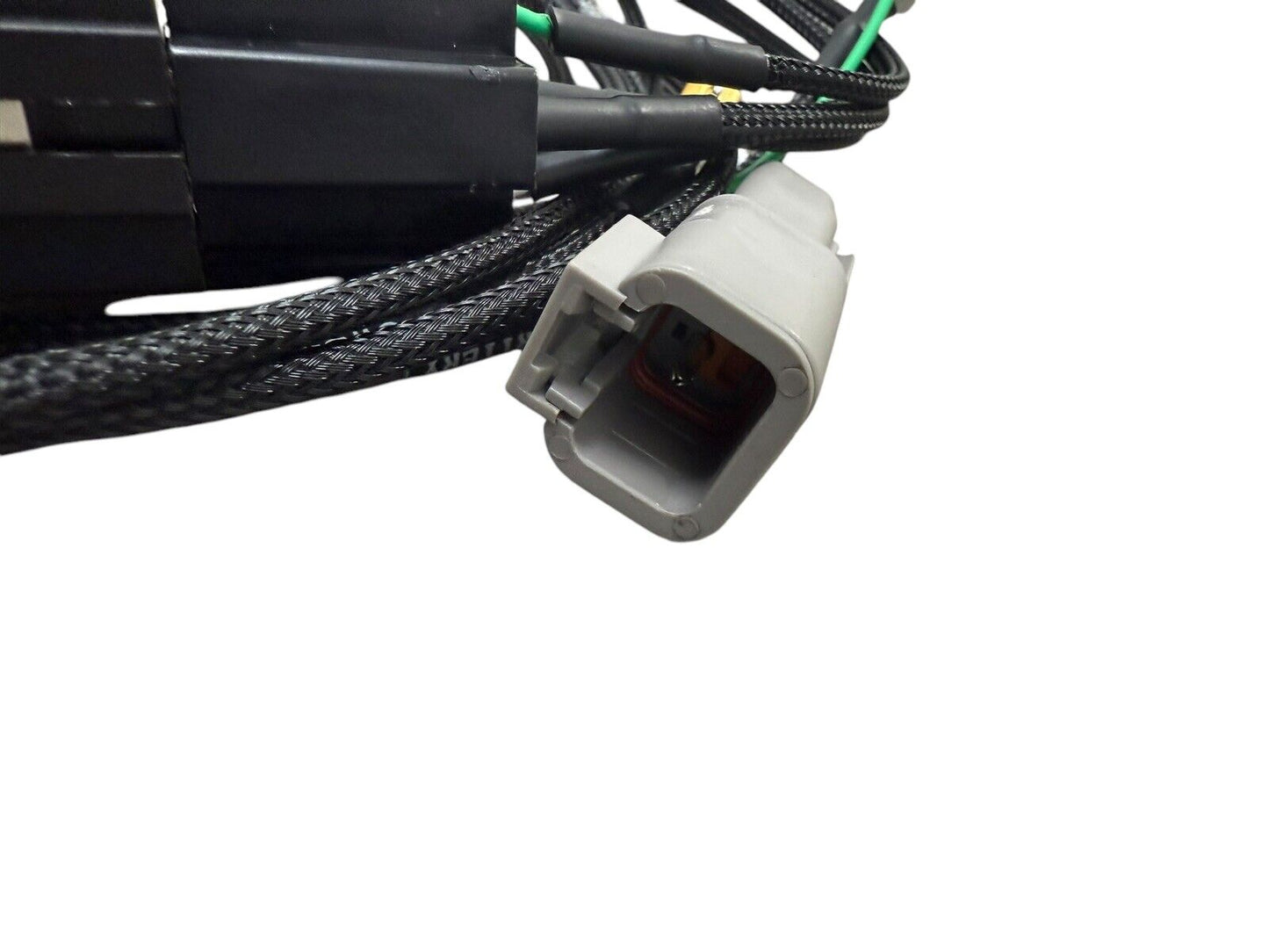 Universal fuel pump relay wiring harness for engine applications by JackSpania Racing, showing the wiring and connectors.