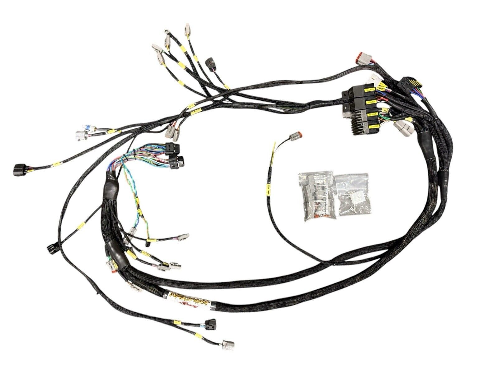 JackSpania Racing engine wiring harness for Fueltech FT550 and 2JZ VVTi engine, with EV1 connectors and detailed wiring.
