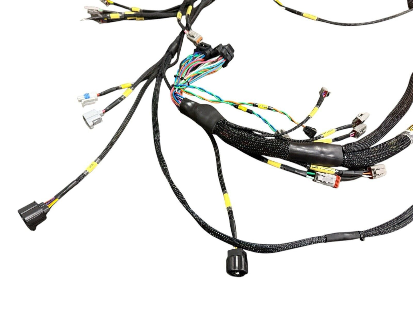 Engine wiring harness for Fueltech FT550 by JackSpania Racing, compatible with 2JZGTE, VVTi, and EV1 engine systems.