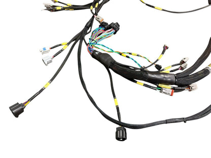 Engine wiring harness for Fueltech FT550 by JackSpania Racing, compatible with 2JZGTE, VVTi, and EV1 engine systems.