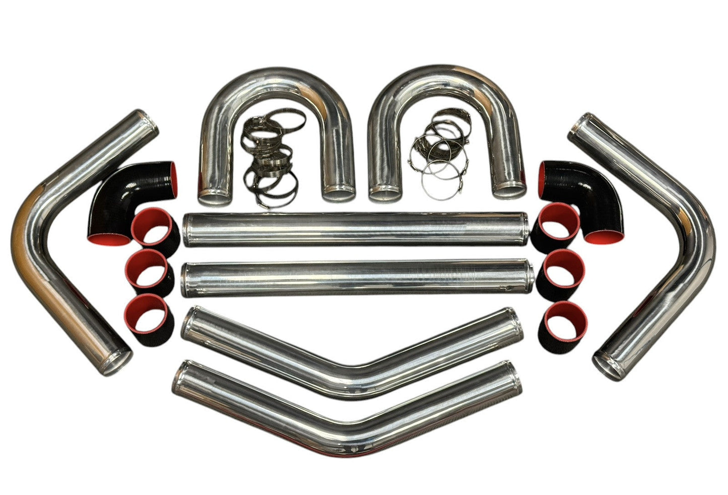 Universal aluminum intercooler turbo piping kit with silicone clamps, 2.5 and 3-inch pipes for engine performance by JackSpania Racing.