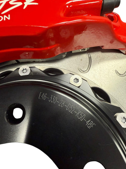 Interior view of JackSpania Racing Big Brake Kit with 2-piece drilled rotor and 4-piston caliper for BMW E46 2001-2006.