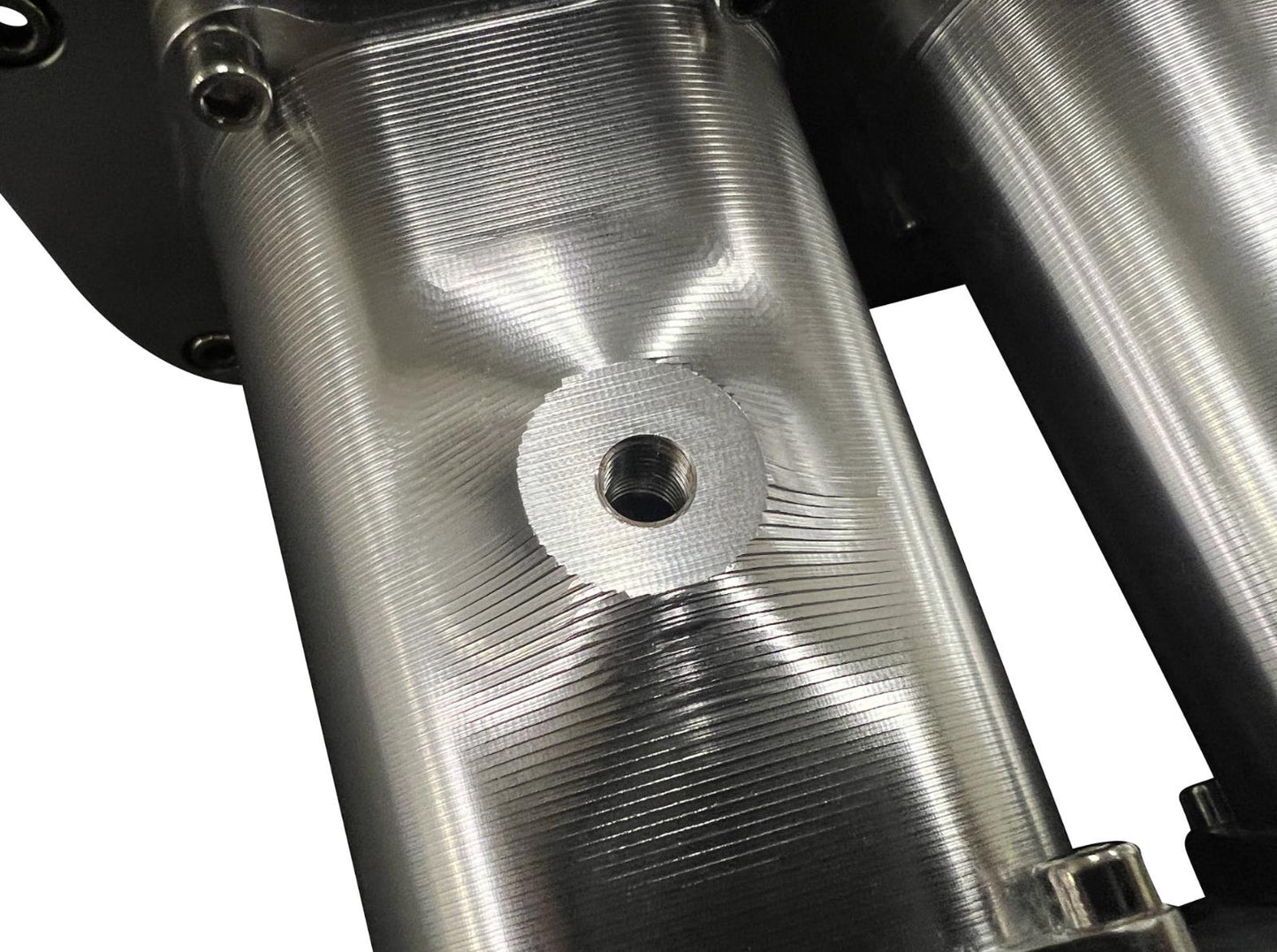 JackSpania Racing fully billet 2JZGE intake manifold with 12 injector fuel rail and throttle body for engine performance.