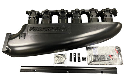 JackSpania Racing 2JZGE intake manifold with 12 injector fuel rail and throttle body for engine performance enhancement.