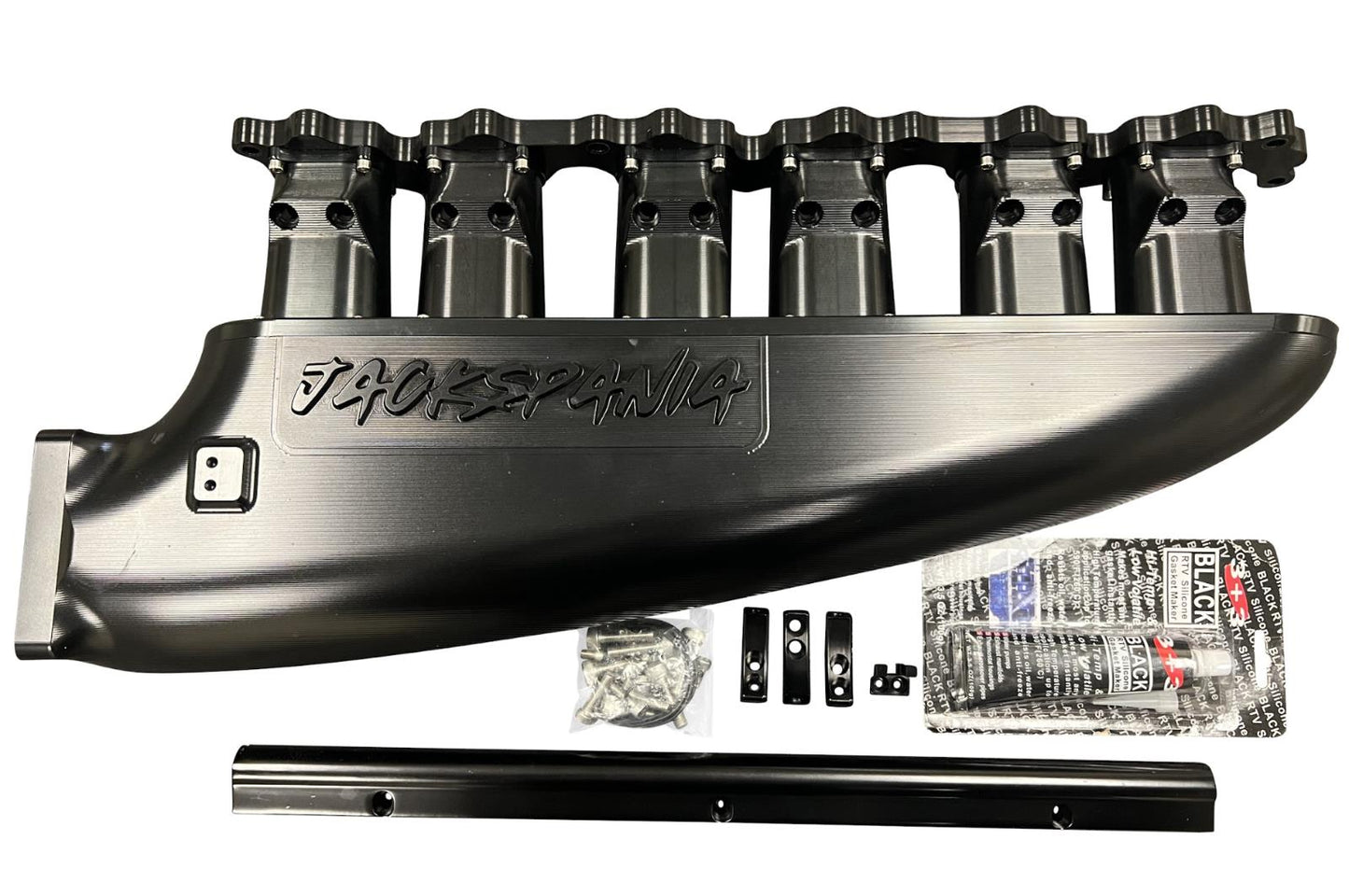 JackSpania Racing 2JZGE intake manifold with 12 injector fuel rail and throttle body for engine performance and tuning.