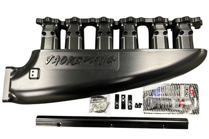 JackSpania Racing 2JZGE intake manifold with 12 injector fuel rail and throttle body for engine performance and tuning.