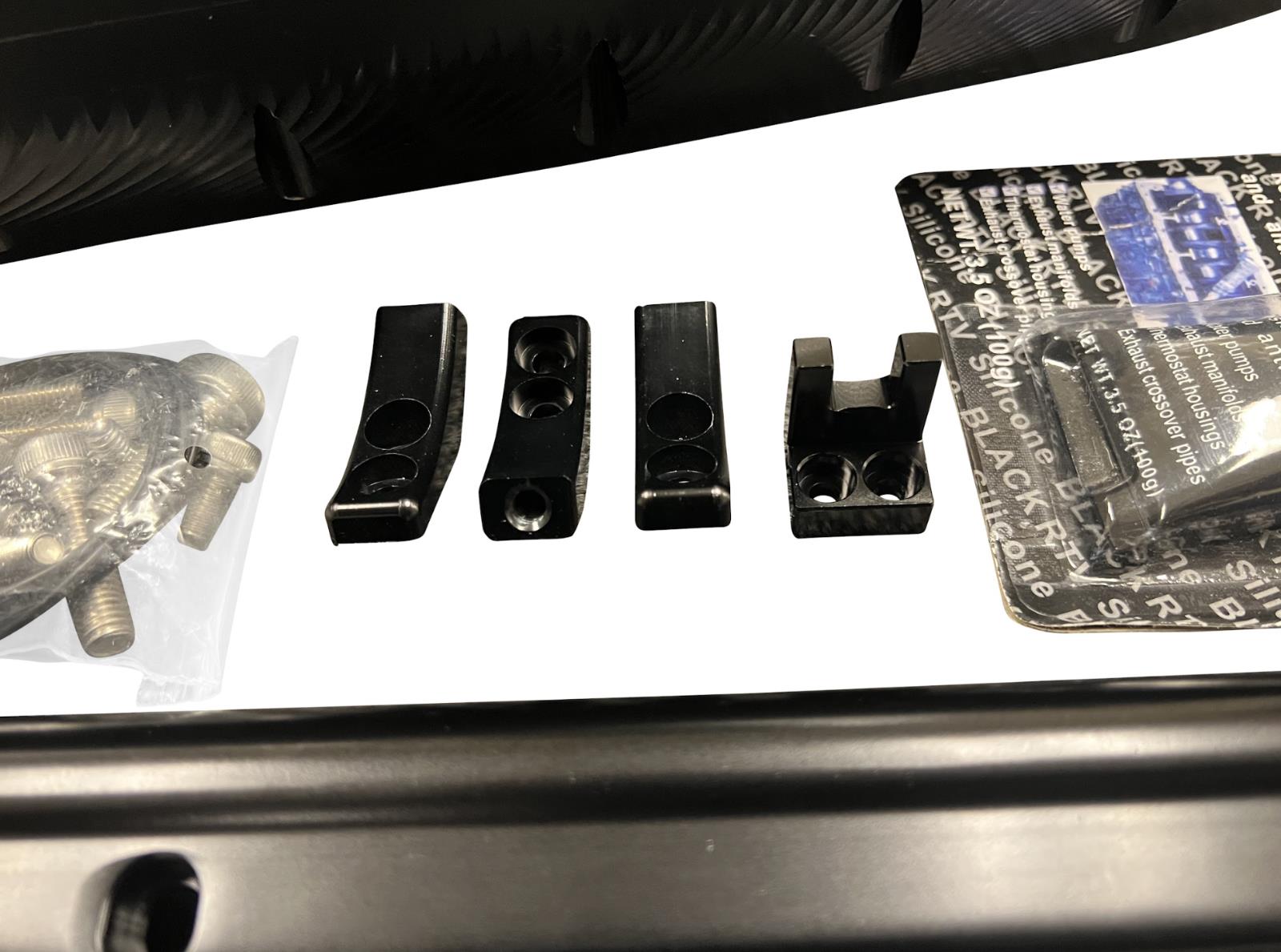 JackSpania Racing fully billet 2JZGE intake manifold with 12 injector fuel rail and throttle body for engine performance.