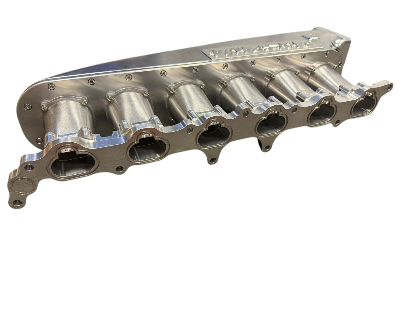 JackSpania Racing Fully Billet 2JZGE intake manifold with 6-injector fuel rail and throttle body for engine performance.