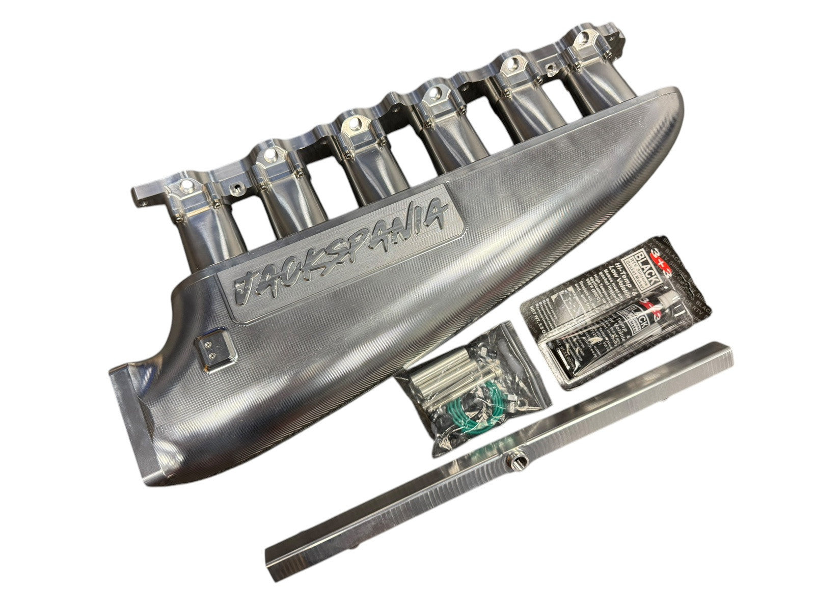 JackSpania Racing 2JZGE intake manifold with 6-injector fuel rail and throttle body for engine performance.