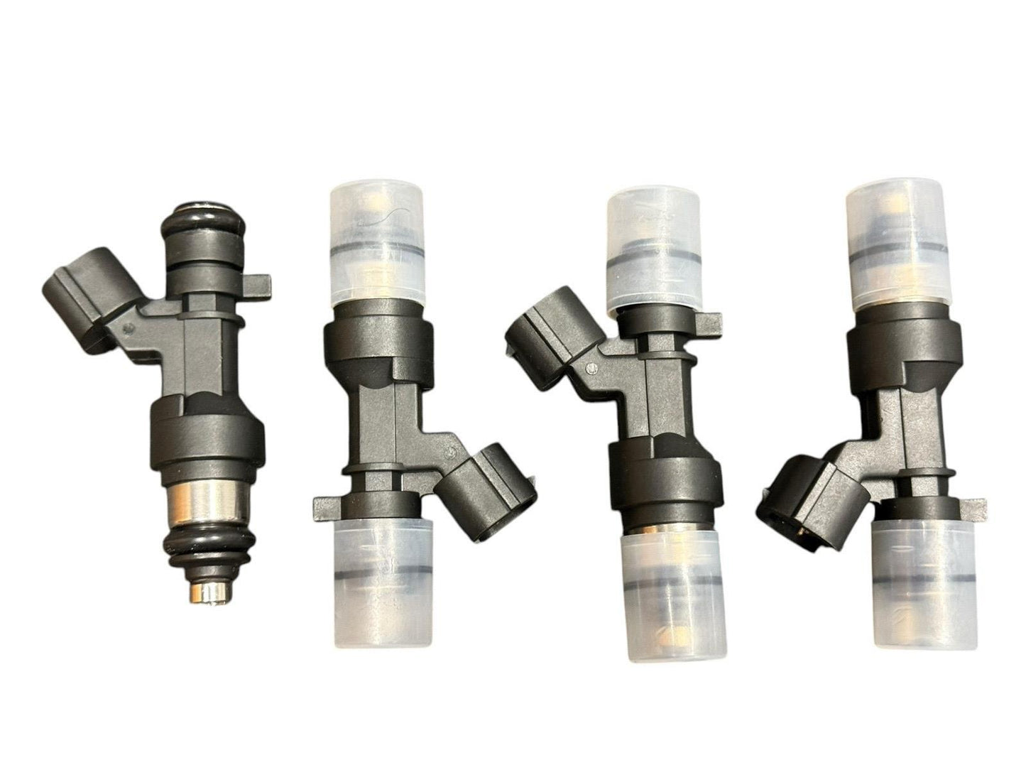 Set of 4 JackSpania Racing K Series K20 K24 flow-matched 1200cc fuel injectors for Honda and Acura engines.