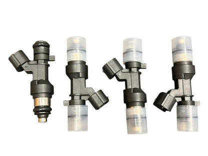 Set of 4 JackSpania Racing K Series K20 K24 flow-matched 1200cc fuel injectors for Honda and Acura engines.