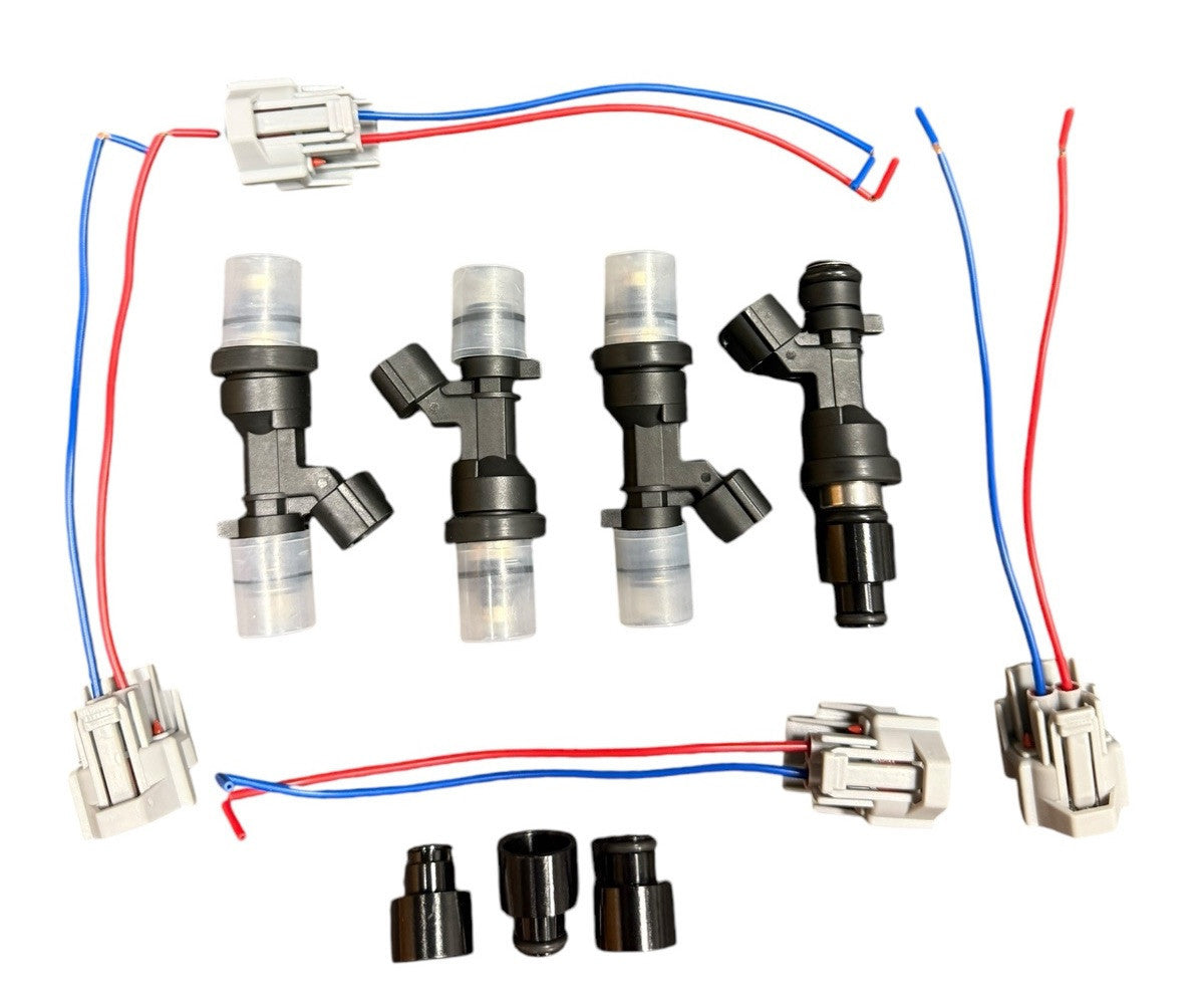 Set of four JackSpania Racing B D F H Series 1200cc fuel injectors for B16, B18, B20, D16, D18, F22, H22 engines, flow matched.
