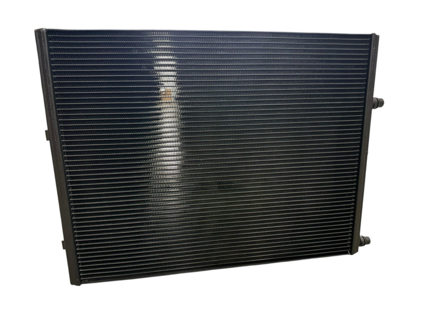 Heat exchanger radiator for BMW G30 G31 5 Series 520i 530i 540i engine, by JackSpania Racing, showing the metal core and inlet outlets.