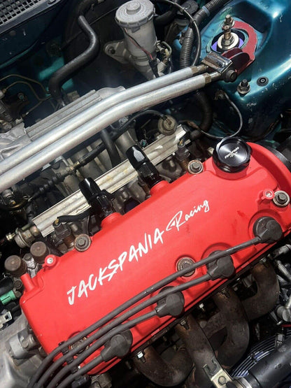Vented valve cover for Honda D series engines, D15 and D16, by JackSpania Racing, with AN10 fittings and VTEC branding.
