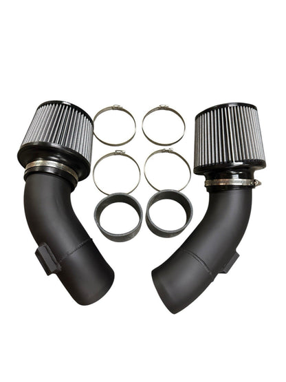 JackSpania Racing high flow cold air intake kit installed in a BMW F10 M5 engine, showcasing sleek engine parts and airflow components.