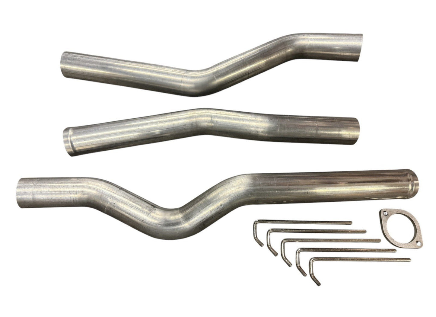 High flow 3-inch mandrel bent exhaust piping for Acura RSX 02-06 by JackSpania Racing, showing smooth curves and polished metal finish.