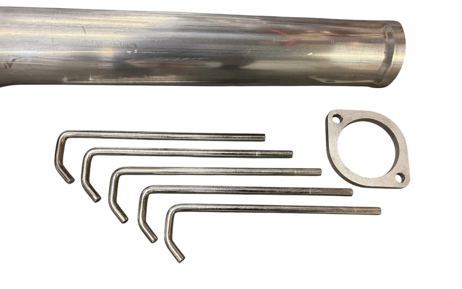 High flow 3-inch mandrel bent exhaust piping for Acura RSX 02-06 by JackSpania Racing, showing smooth curves and polished finish.