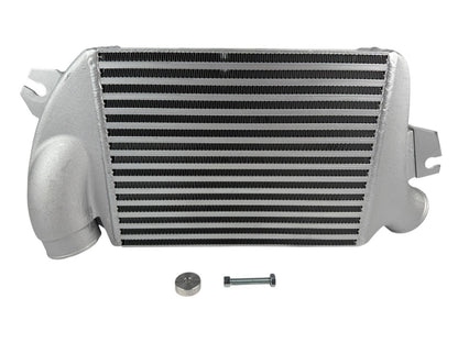 Top mount intercooler for Subaru WRX, Legacy GT, and Forester 2.0L Turbo by JackSpania Racing, shown installed in engine bay.