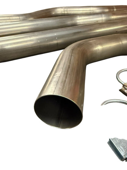 3-inch mandrel bent exhaust piping from JackSpania Racing for Honda Civic EG EK DC2, showing smooth curves and polished metal finish.