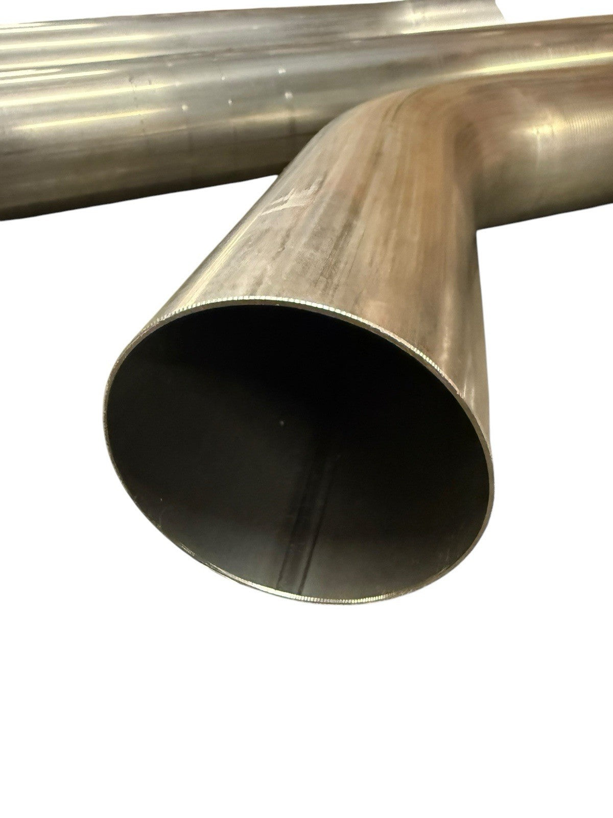 3-inch mandrel bent exhaust piping for Honda Civic EG EK DC2 by JackSpania Racing, showing smooth curves and polished metal finish.
