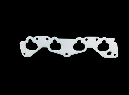JackSpania Racing thermal intake manifold gasket for Honda Civic D15 D16 D Series engine, visible with black rubber and metal components.