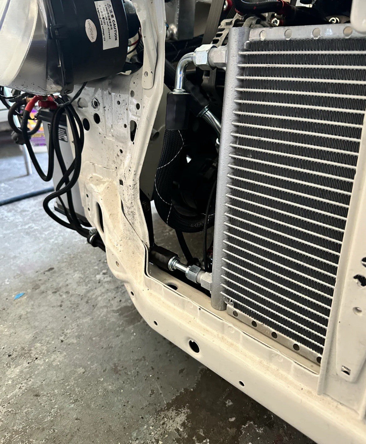 JackSpania Racing K Series K20 K24 AC line tuck kit installed in a Honda Acura Civic Type R K Swap engine, showcasing engine components.