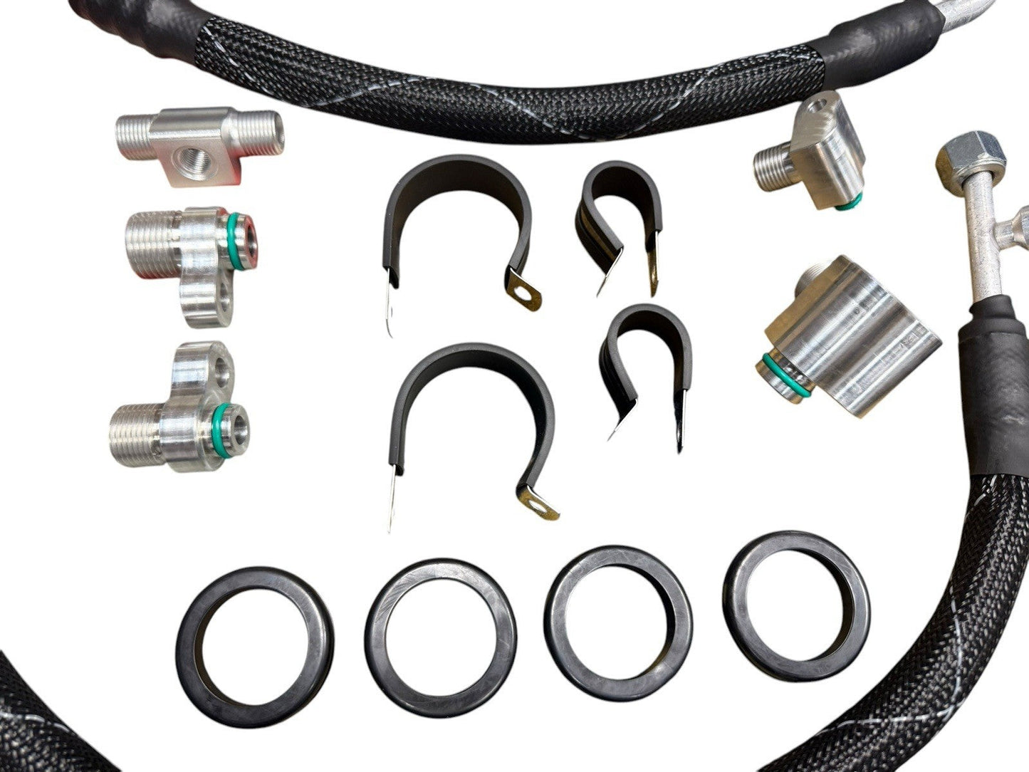 JackSpania Racing K Series K20 K24 AC line tuck kit installed in a Honda Acura Civic Type R engine bay, showcasing engine parts.