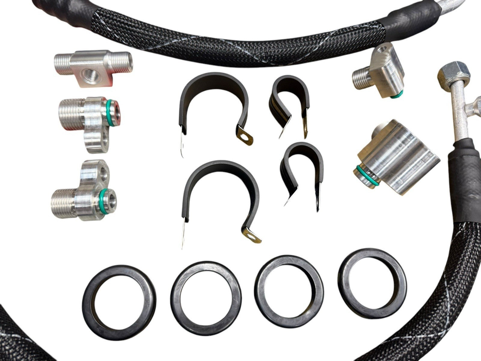 JackSpania Racing K Series K20 K24 AC line tuck kit installed in a Honda Acura Civic Type R engine bay, showcasing engine parts.