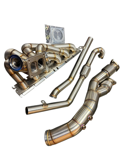 BMW S58 G80 G82 G83 G87 single turbo manifold hot-side kit by JackSpania Racing, showing metallic turbo manifold components.