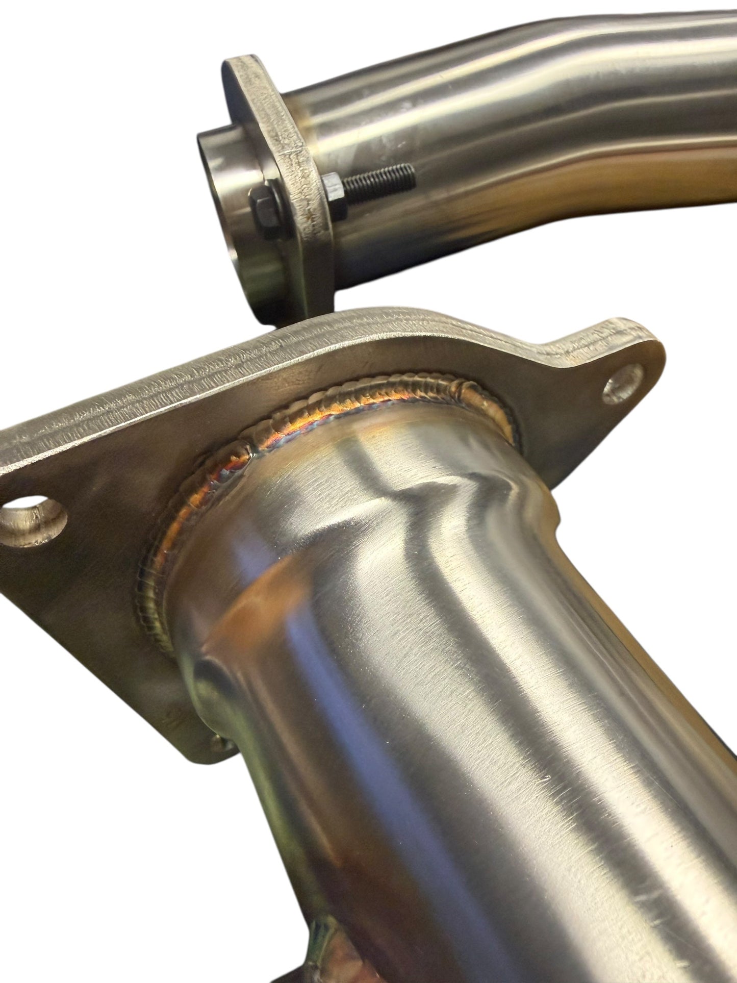JackSpania Racing high flow catless J-pipe downpipe for 2022+ Subaru WRX VB exhaust system, showing the stainless steel pipe with flange