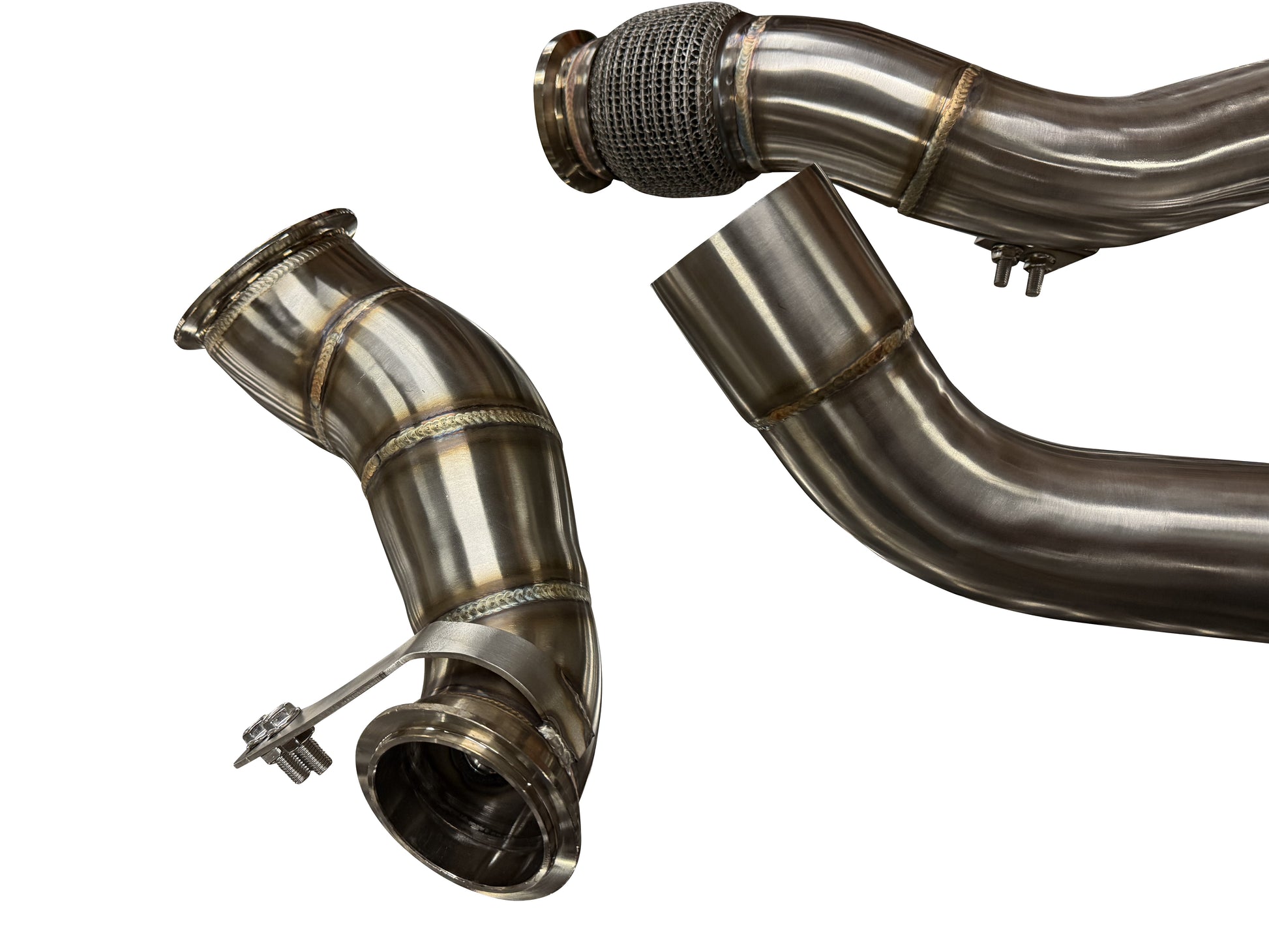 BMW F90 M5 M8 engine parts, JackSpania Racing downpipe and midpipe for S63 engine, close-up view of shiny metallic components.