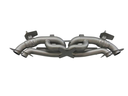 Titanium valved sport exhaust system for Porsche 992 Carrera Turbo by JackSpania Racing, showing sleek exhaust pipes and valves.