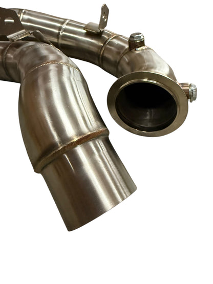 JackSpania Racing BMW M5 and M6 S63 racing downpipes, exhaust parts for F06, F10, F12 models, showcasing high-performance metal piping.