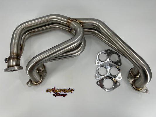 Subaru WRX and STi EJ25 equal length exhaust manifold header by JackSpania Racing, showcasing polished metal construction and inlet ports.