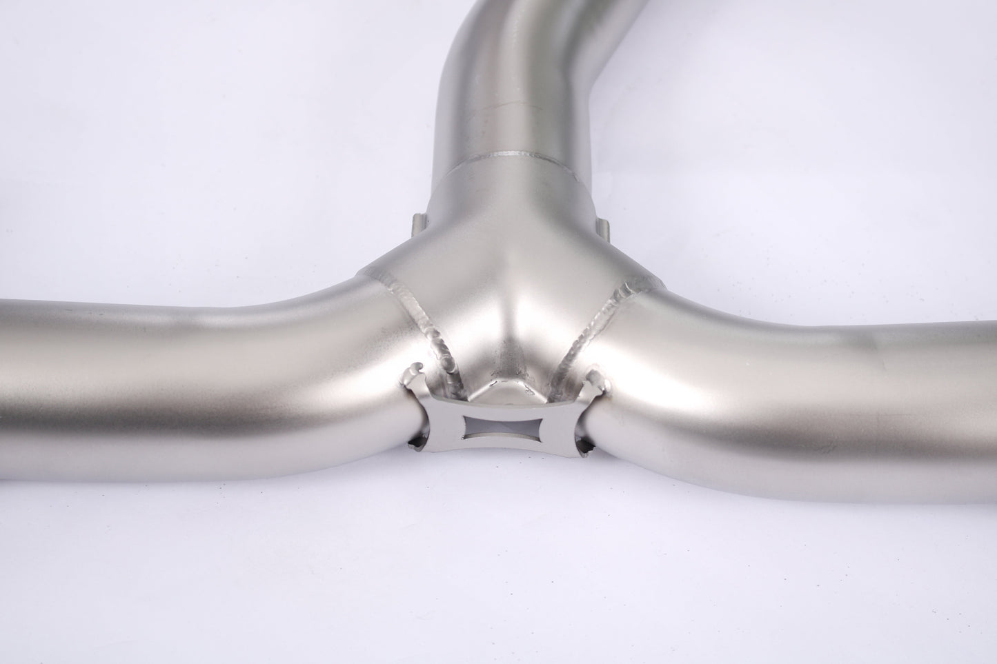 Honda Civic 1.5T sedan valved cat-back performance exhaust system by JackSpania Racing, showing the stainless steel exhaust pipes and muffler.