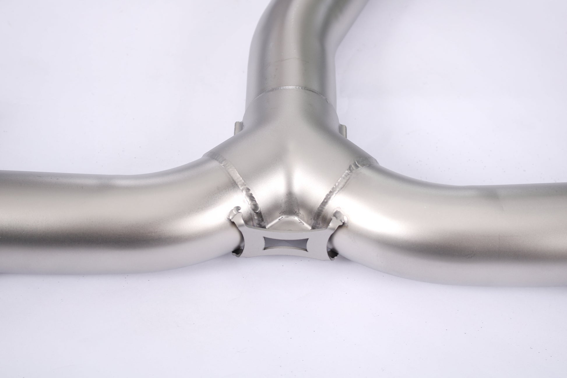 Honda Civic 1.5T sedan valved cat-back performance exhaust system by JackSpania Racing, showing the stainless steel exhaust pipes and muffler.