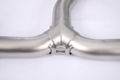Honda Civic 1.5T sedan valved cat-back performance exhaust system by JackSpania Racing, showing the stainless steel exhaust pipes and muffler.